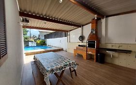 Casa de Praia Ampla com Ar Condicionado e Piscina Privativa